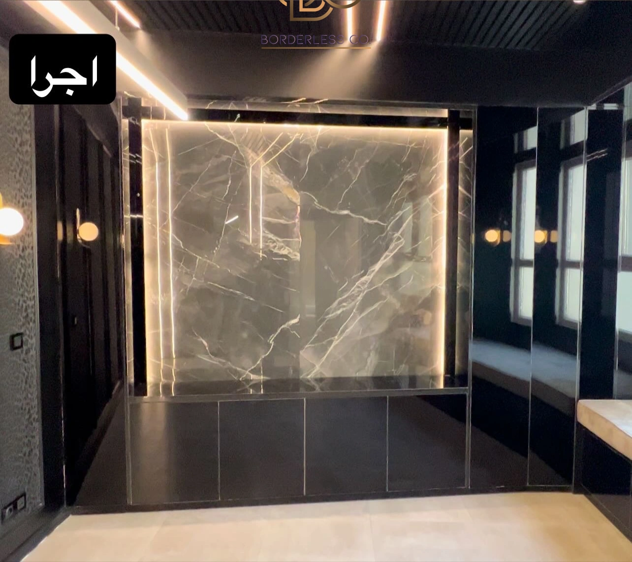 عکس اجراشدهٔ سالن با دیوار سنگ نوردار